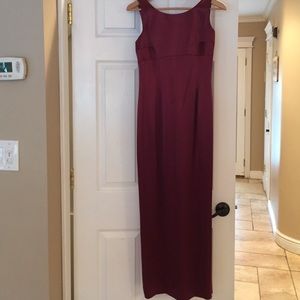 Tahari burgundy gown with a slit in the back!