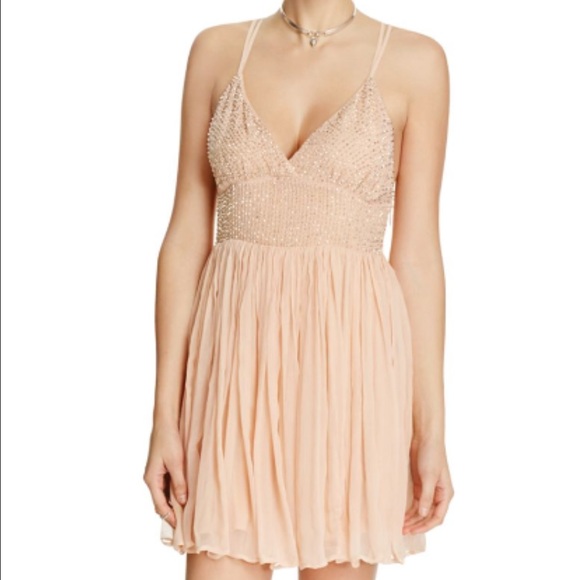 Free people like a diamond mini dress BNWT