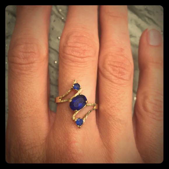 14K gold ring with three blue stones!