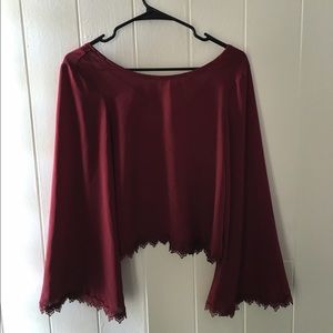 Bell sleeve blouse.