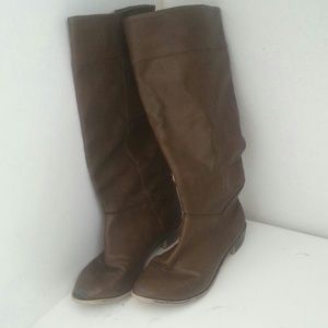 Brown leather knee high riding boots