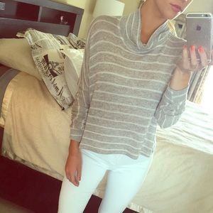 Grey and white striped knit turtle neck