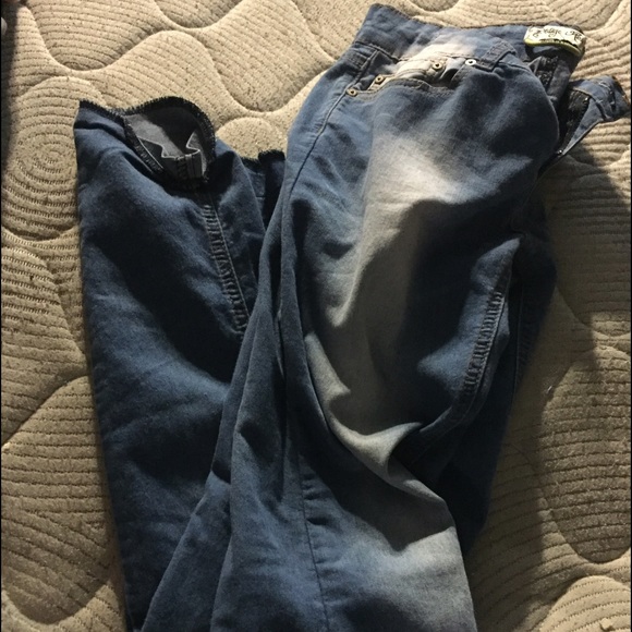 Distressed colored blue skinny jeans