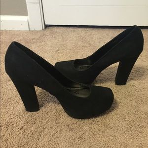 Black suede pumps