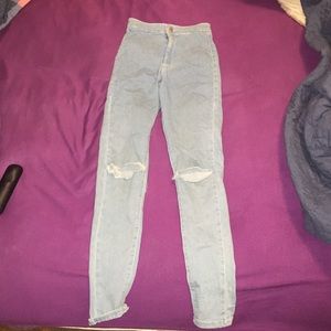 High wasted  skinny jeans. Light wash.