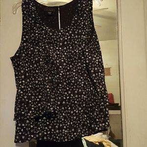 Sleeveless black and white layered blouse