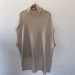 BCBG sleeveless hi-low sweater. Size XS/S