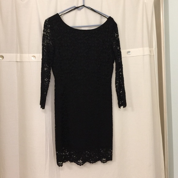Black, long sleeve lace dress.
