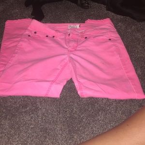 Bright pink skinny jeans