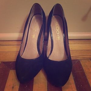 Black suede pumps