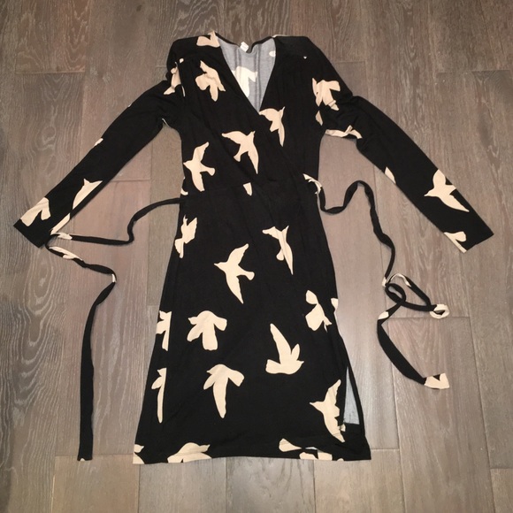 Black and tan wrap dress with bird print