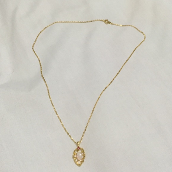 Gold necklace with Opal