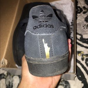 black adidas superstars New York City pack