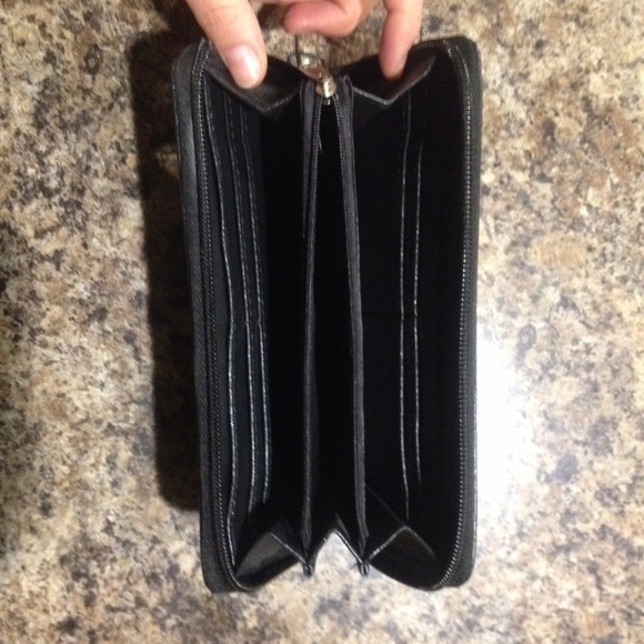 Black Izod wallet leather material