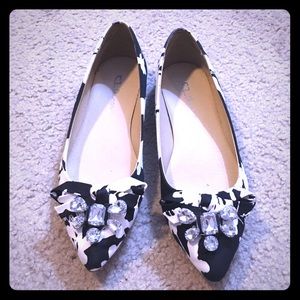 Black and white floral flats with toe bling