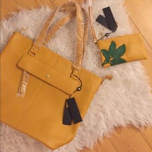 Genuine leather handbag and matched wristlet