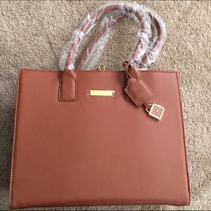 Joy and Iman tote