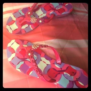 Coach pink flip flops