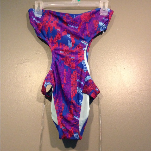 Whole body bathing suit with cut outs
