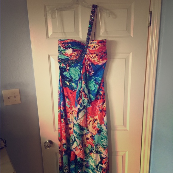 Floor length prom dress with beaded side strap
