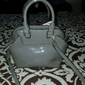 Grey patent leather crossbody vegan material