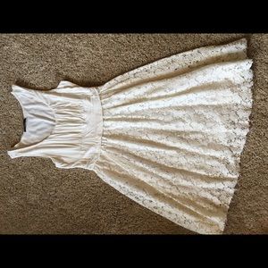 White top fitted flowy bottom lace dress