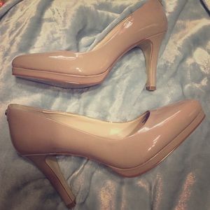 Faux leather nude heels.