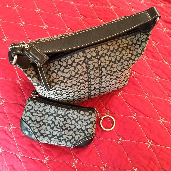 Mini Black Coach Bag with key or coin purse.