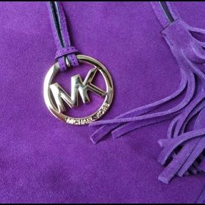 Purple suede Michael Kors purse