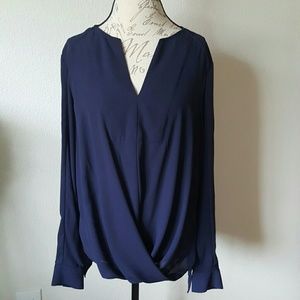 Navy blue, long sleeved, slight V-neck blouse