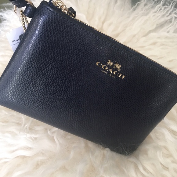Coach Handbags - ✨Coach Genuine Leather NWT Navy Leather Wristlet✨