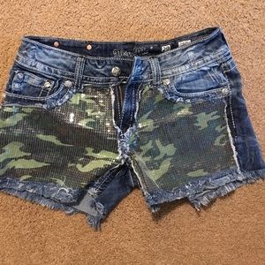 Camo miss me shorts.