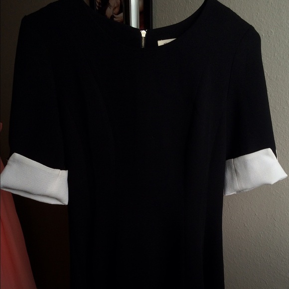 LITTLE BLACK DRESS! White cuffs and fitted details