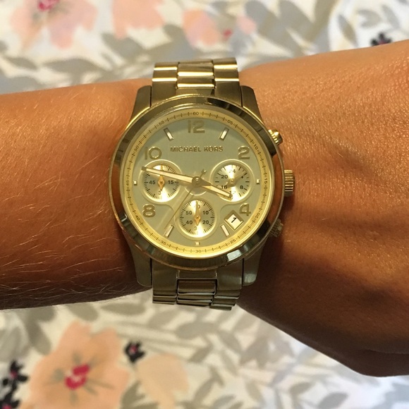 Gold Michael Kors sport watch