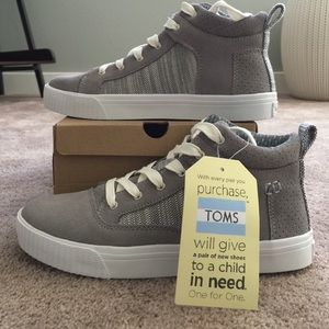 Brand new Toms grey suede high top sneakers.