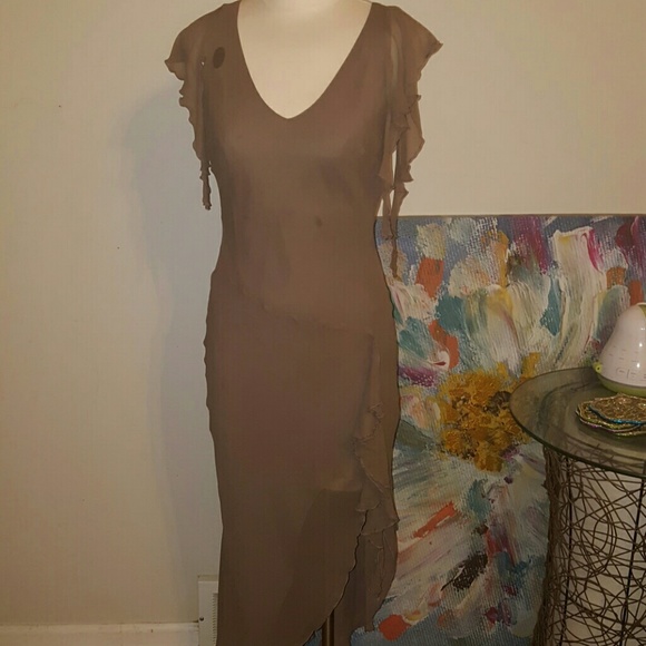 Dress 100% silk and lined with polyester..beautifu