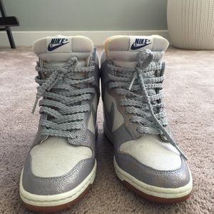 Nike Dunk Sky High high top wedge sneakers.