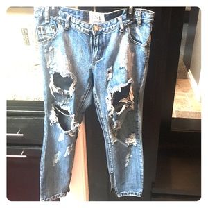 Destroyed denim ankle jeans