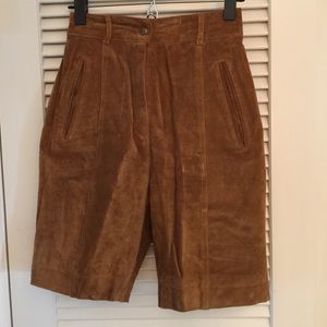 Vintage tan leather shorts with nylon lining.