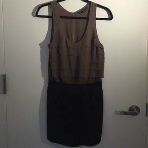 A fun romper shorts with sequin raffle.