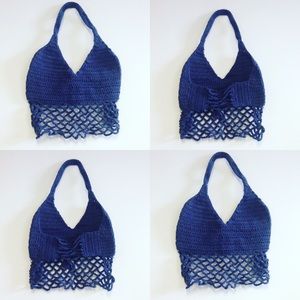 A handmade one of a kind crochet crop top