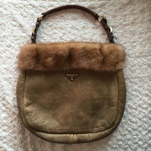 Authentic Prada leather, mink, wool lined purse.