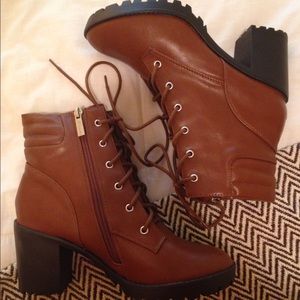 Army style brown heeled booties.