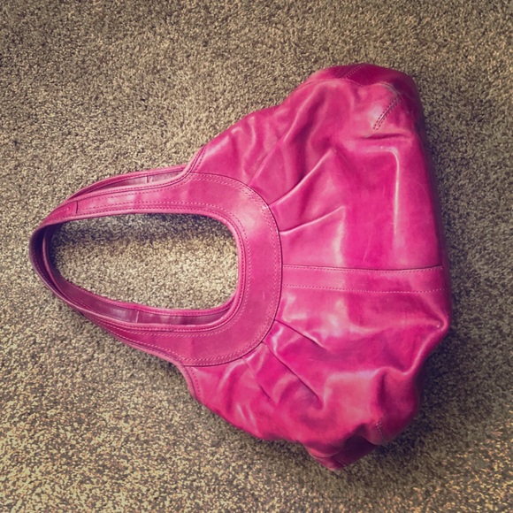 Magenta, very loved. color wearing off, spots