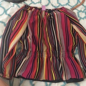 selling a multi color shirt