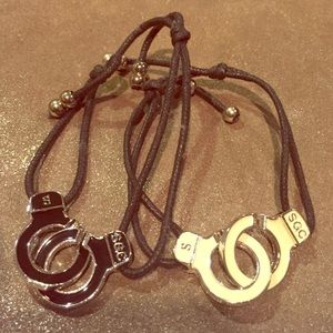 Set of 2 handcuff bracelets