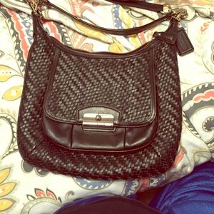 Black leather Coach messenger bag