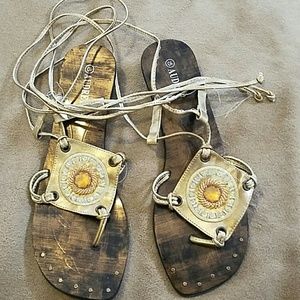 Strappy sandals. Very nice looking copper and gold