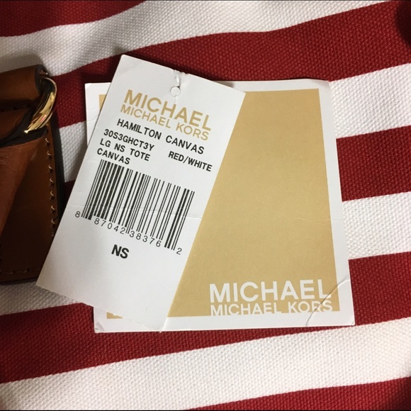 Tags to MK purse in my closet from Dillard's rare - Picture 1 of 3