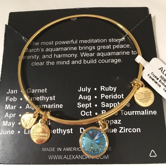 Gold bracelet with aquamarine charm